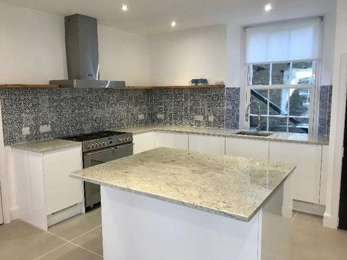 small kitchen with granite worktop