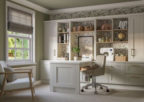 A white room with a desk and shelves