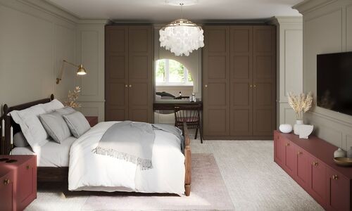Bedroom with brown built-in wardrobes and dusty pink storage units