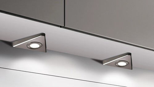 Triangular under-cabinet LED lights in modern kitchen
