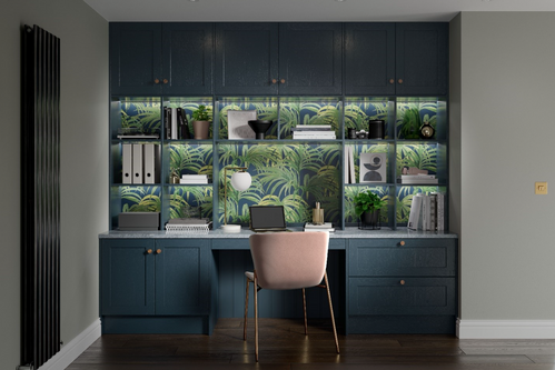 Home office with blue cabinets and tropical wallpaper backdrop