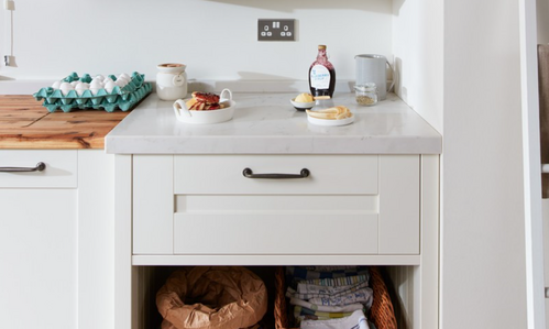 White kitchen drawer with counter space and storage below