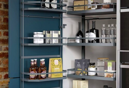 Open kitchen larder with jars, tins, and modern storage solutions