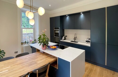 blue handleless kitchen