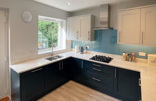 white and blue shaker kitchen