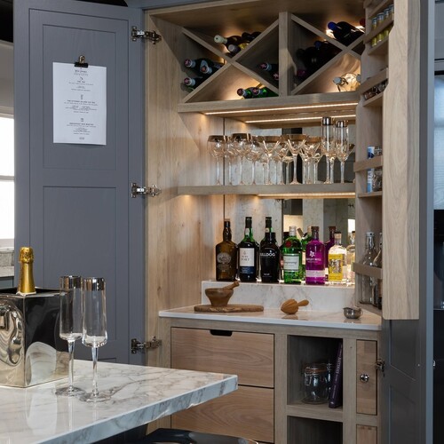 black worktop in a dark kitchen