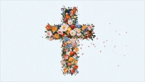 picture of a crucifixion cross made of flowers