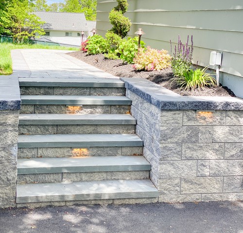Fire pit with Adirondack chairs and white inlay detail in Pompton Lakes NJ