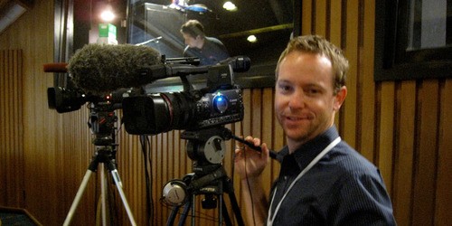 man with video camera