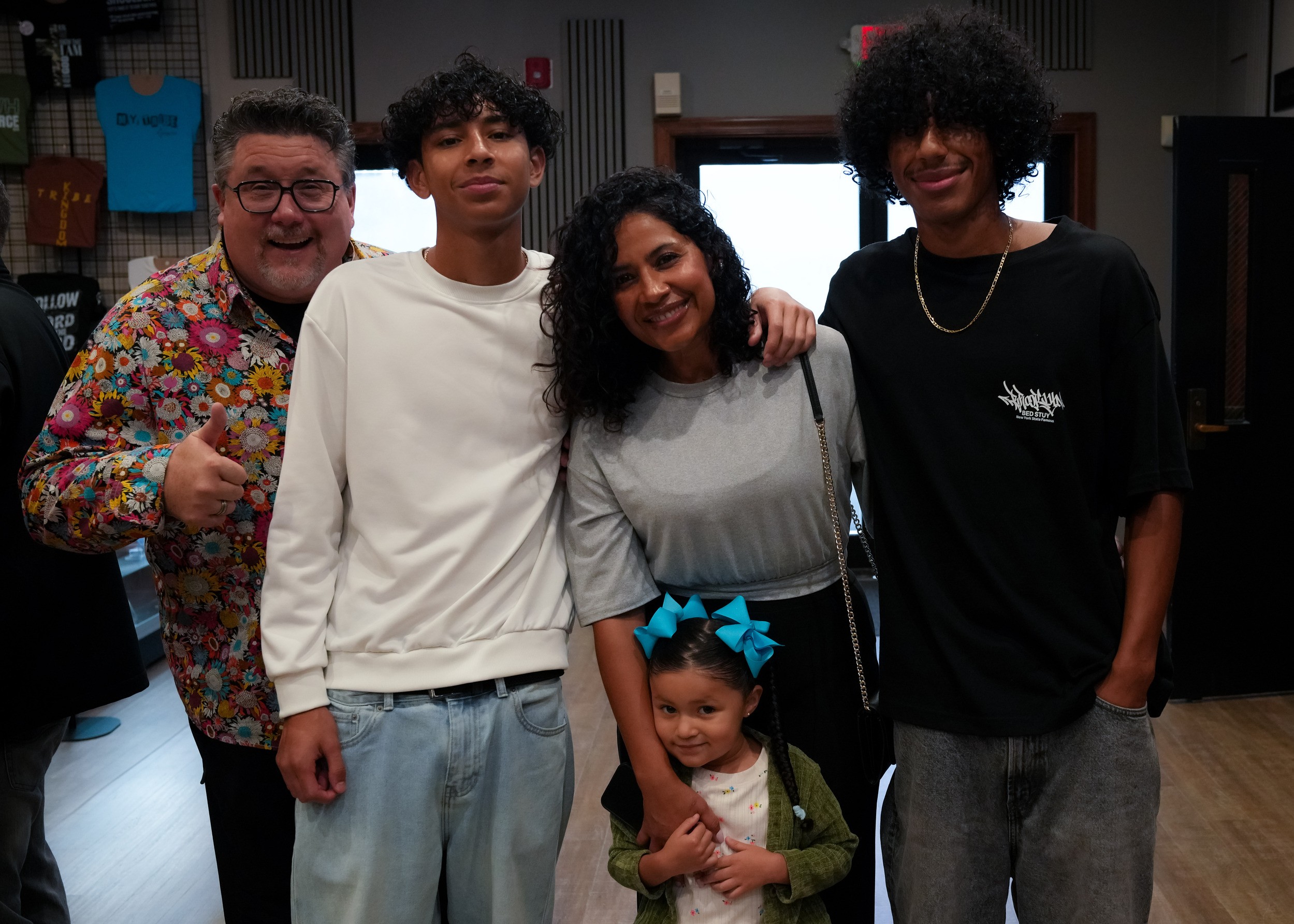 A family with Michael Kelly, Lead Pastor of Central Triad Church, in Grand Central