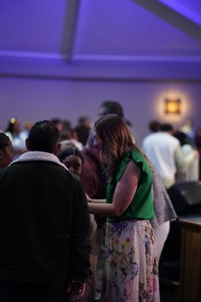 Men embracing in fellowship at a Central Groups men's event at Central Triad Church