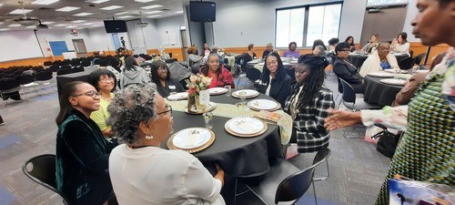 Gathering for lunch provided by Chef Shac