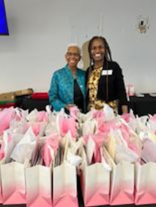 Juanita and Teresa greeted the attendees
