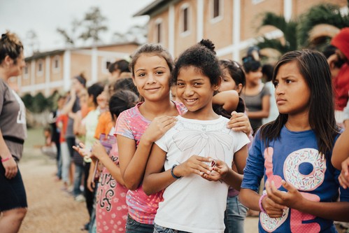 Children gathered during a community outreach
