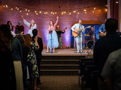 Worship band singing at Sunday morning service