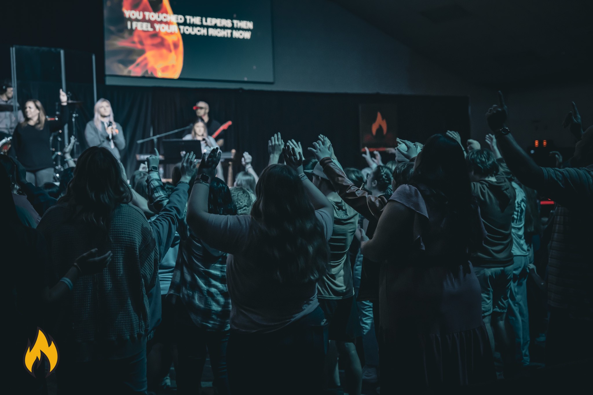 Students worshipping at a WNC Youth and Discipleship gathering