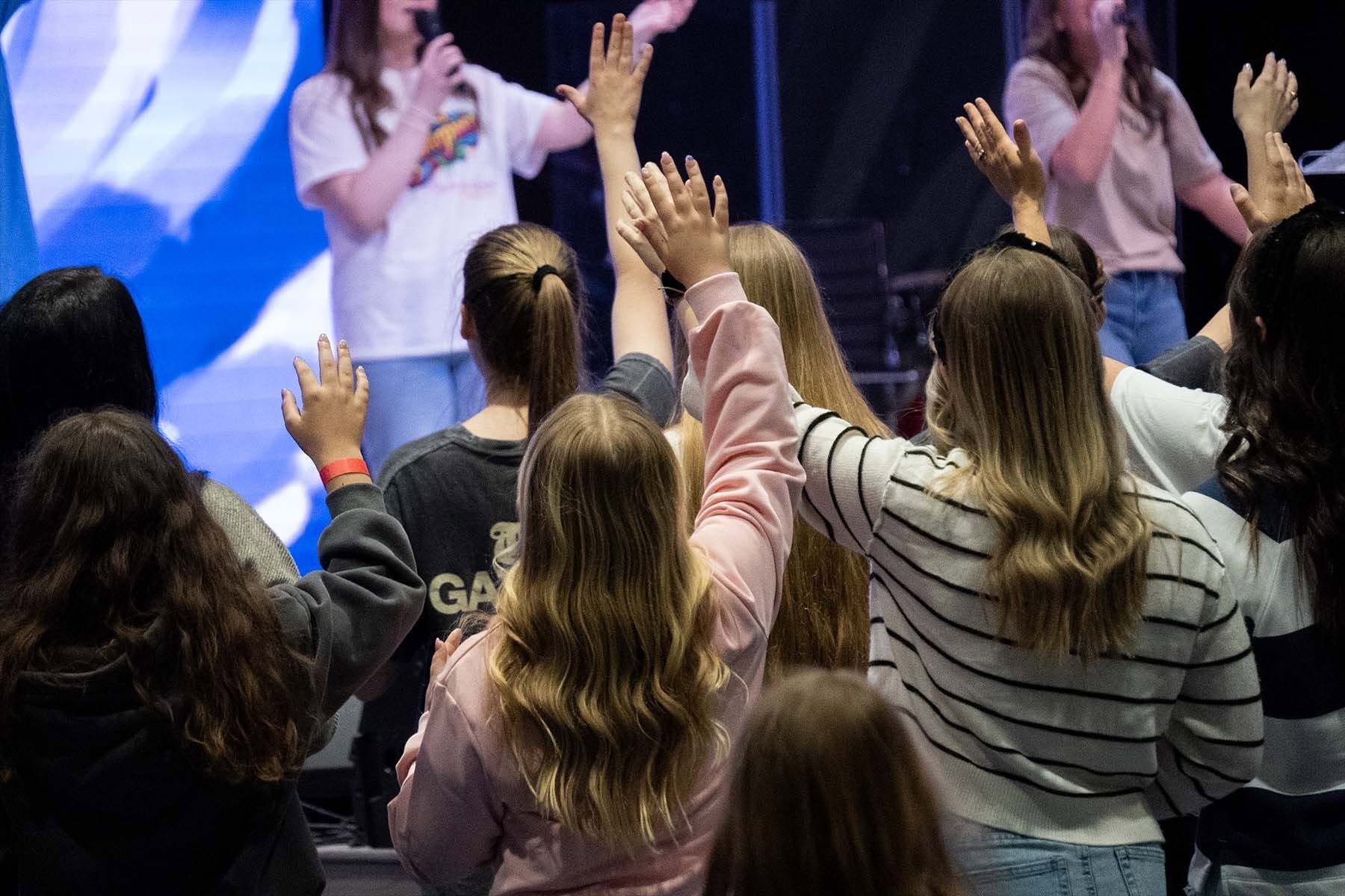 Girls worshiping through WNC Girls Ministries