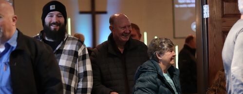 Image of congregation members smiling