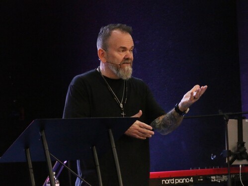 Lead Pastor Kelly Goins speaking during a Sunday service at Watts Bar Community Church.