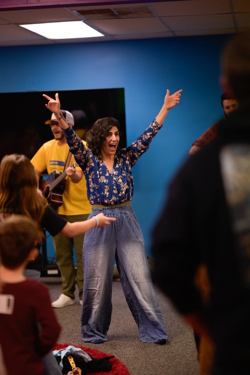 Worship leaders leading kids in worship at Liberty Church, a non-denominational church in North Carolina.