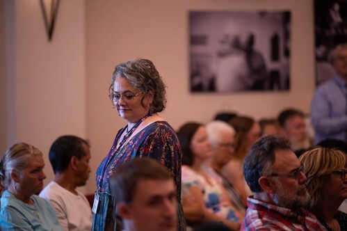 One of our Care Team members collecting offering during a service.