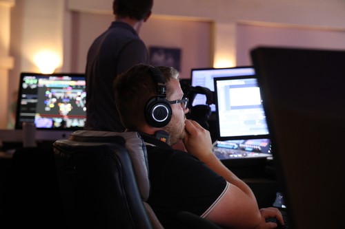 Tech assistant works in the sound booth during Night of Worship in the sanctuary of Liberty Church, a Havelock, NC non-denominational church.