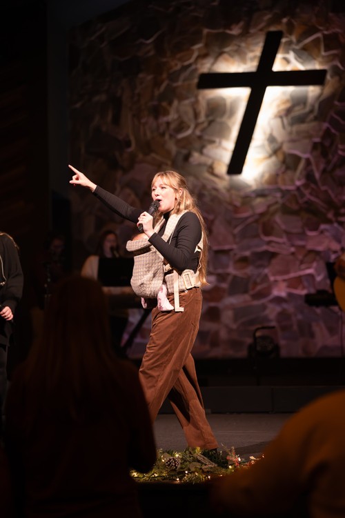 pastor anna singing at a night of worship at liberty church of havelock.