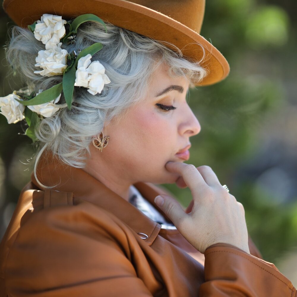 Prudence O'Haire with white roses in her hair