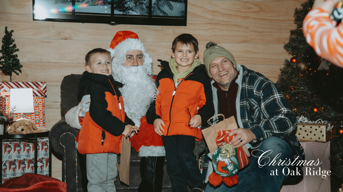 A family enjoying Santas Wonderland at Oak  Ridge