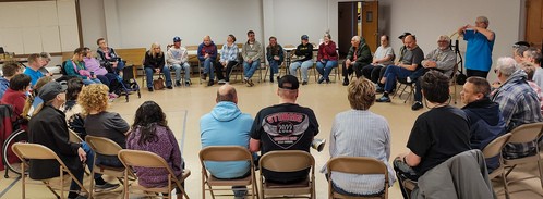 people engaging in a group conversation