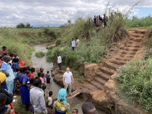 Pastor Nathan Pitney baptizing new converts in Africa