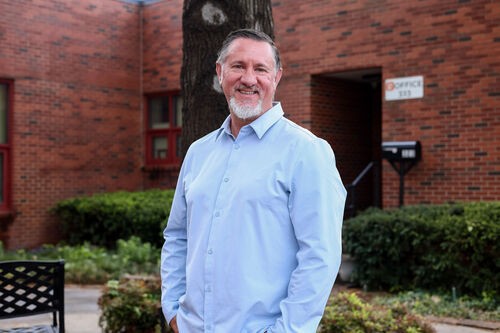 Headshot of a UHBC pastor or staff member smiling outdoors in Stillwater, Oklahoma