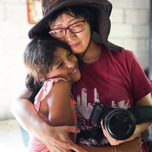 Visiting a child on a short term mission trip