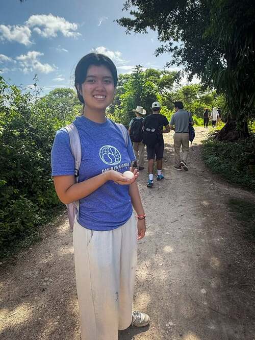 Angela Holding the Gift from Matteo