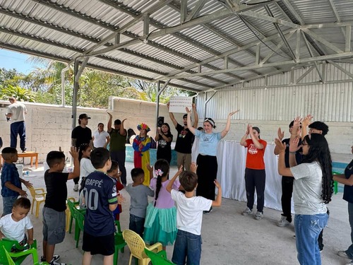 Noel and other team members at VBS