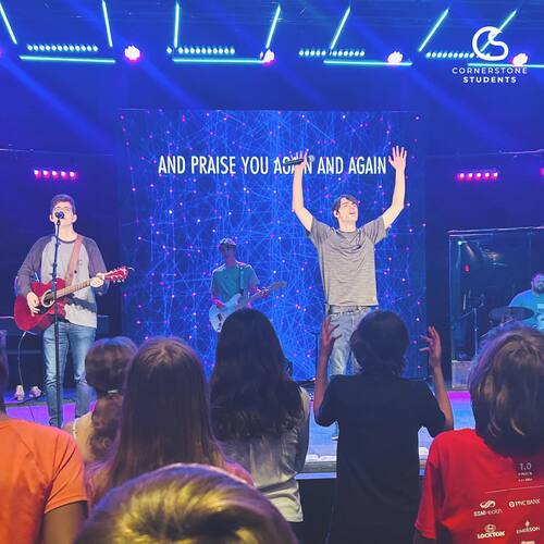 Cornerstone Christian Church students leading worship at youth group