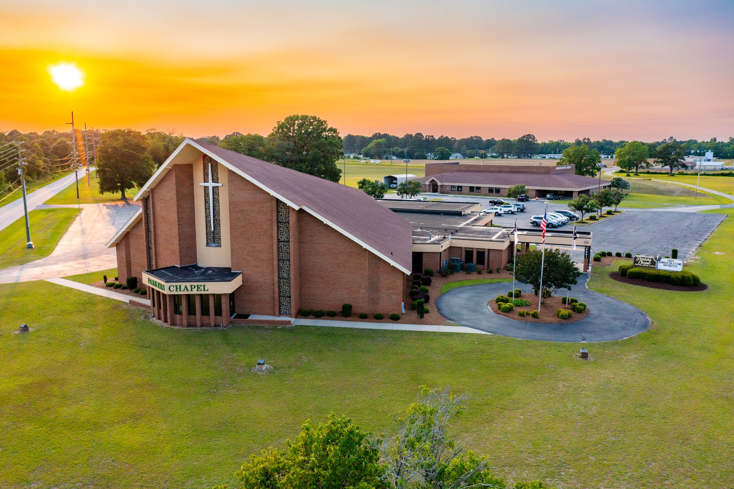 An aerial view of Parkers Chapel’s current campus at sunset.