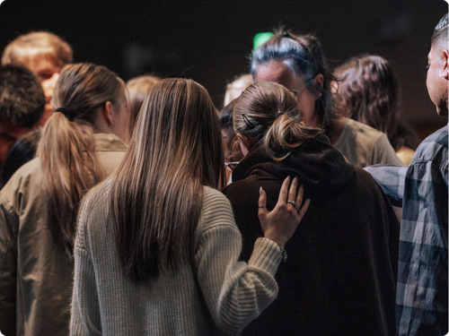 People praying for each other at Canyon View Church