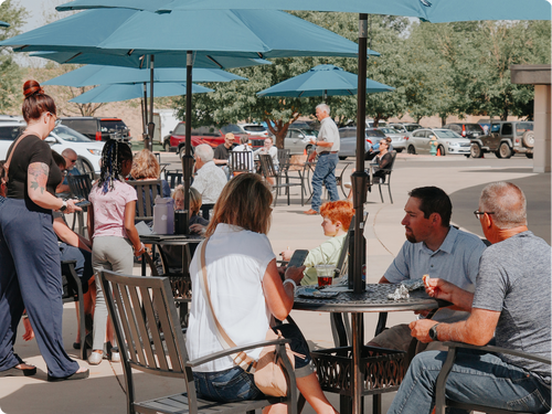Friends gathered around a picnic table at Canyon View Church