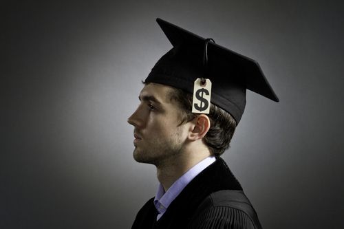 College graduate wearing tuition price tag on mortarboard, horizontal