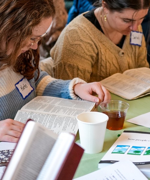 women reading Bible together, womens ministry
