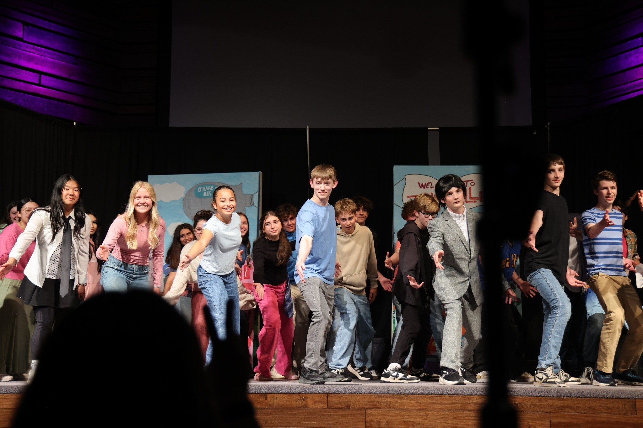 Heritage students performing together in a school theater production