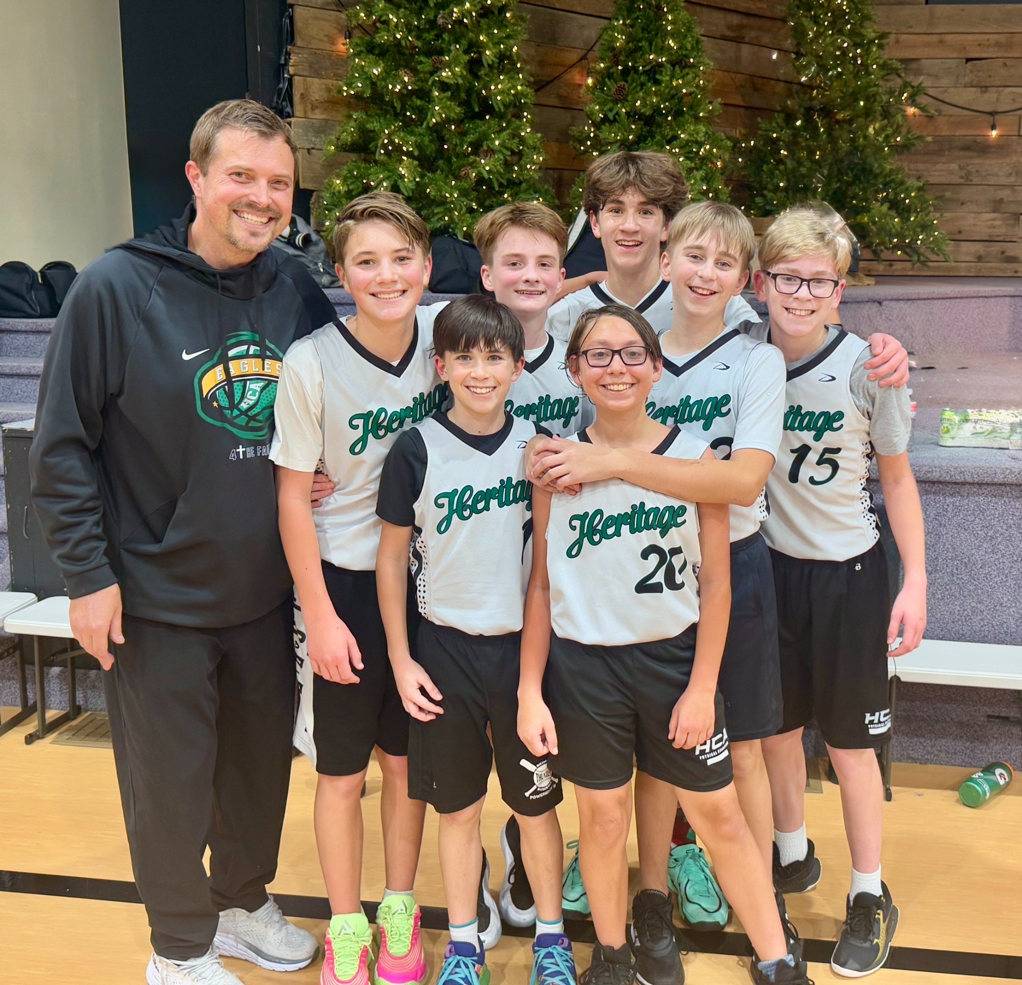 Heritage basketball team with their coach