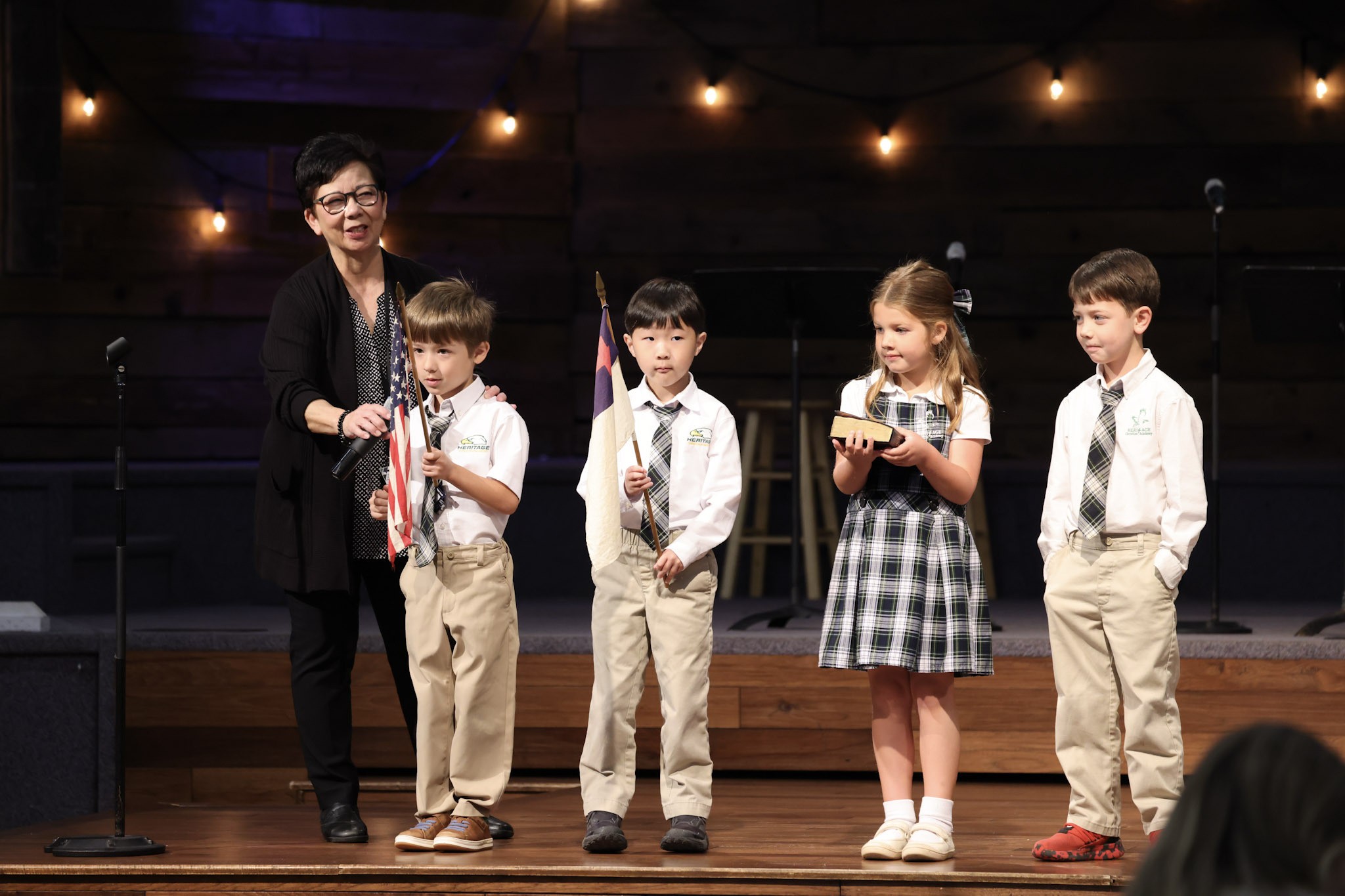 Fourth-grade students performing a Bible story in Share Chapel