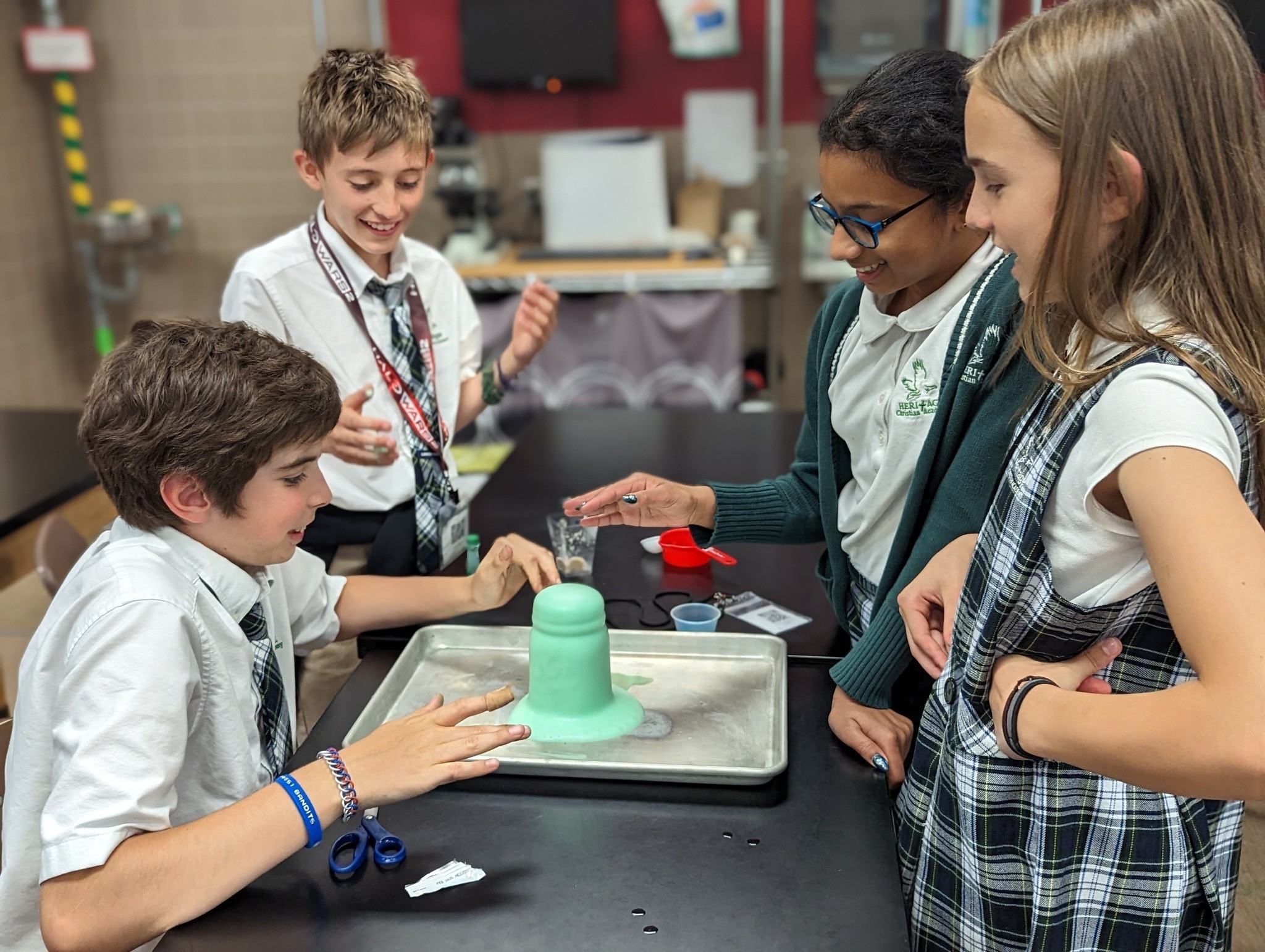 HCA students conducting a hands-on science experiment