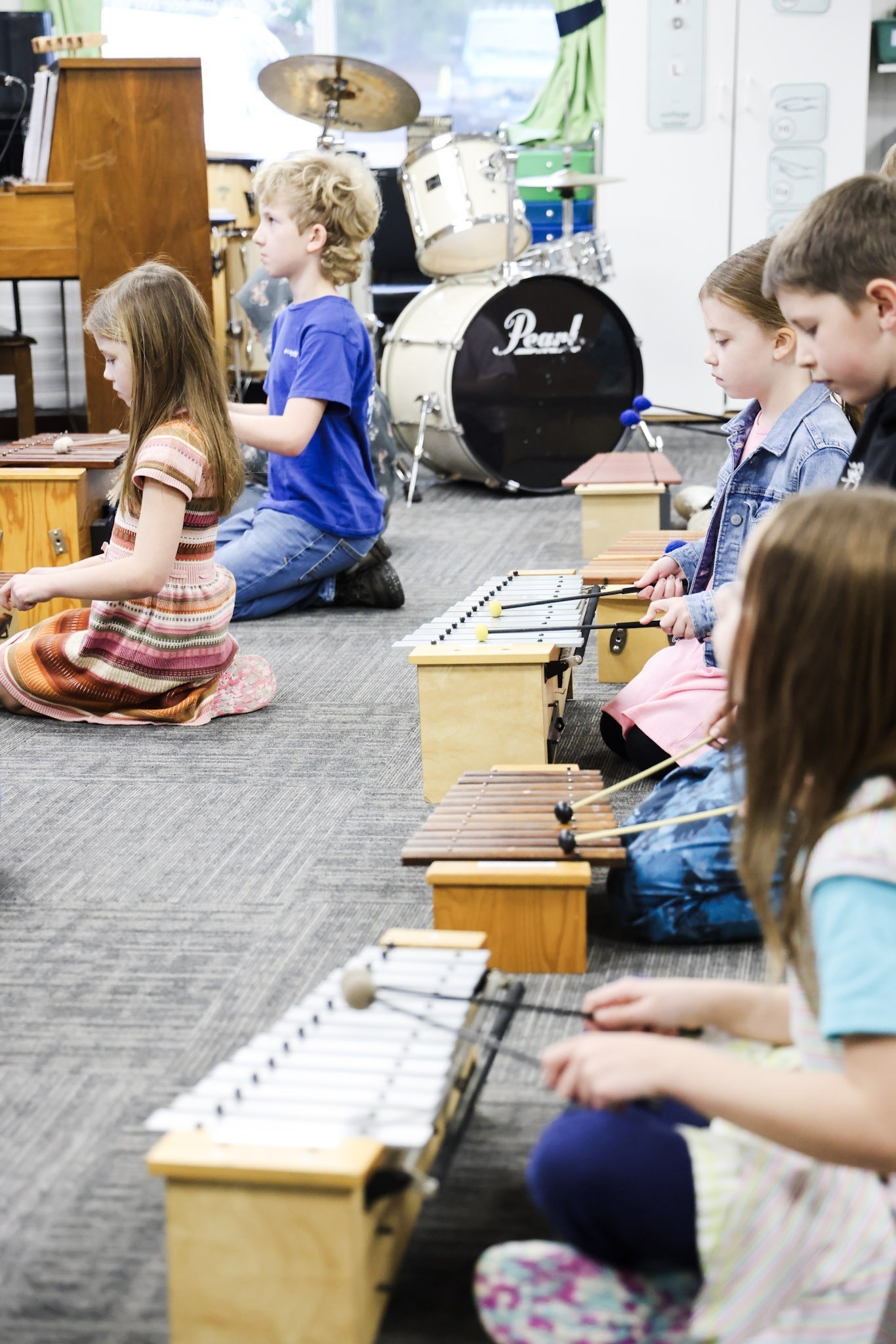 HCA students playing xylophones in music class