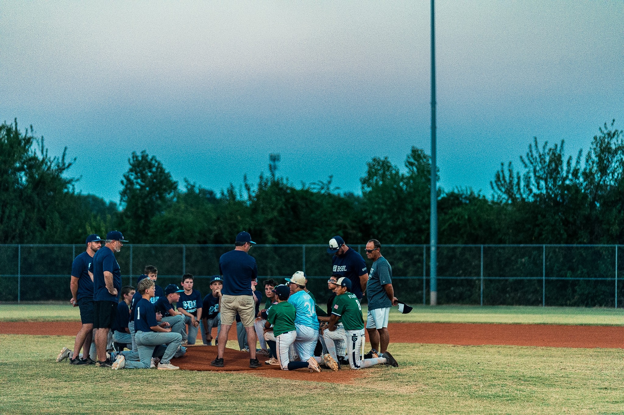 Sharing the Gospel with our opponents on the mound after the game