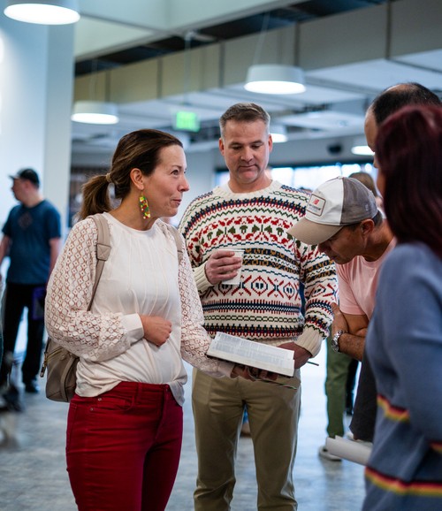 A group of men talking at One Hope Church
