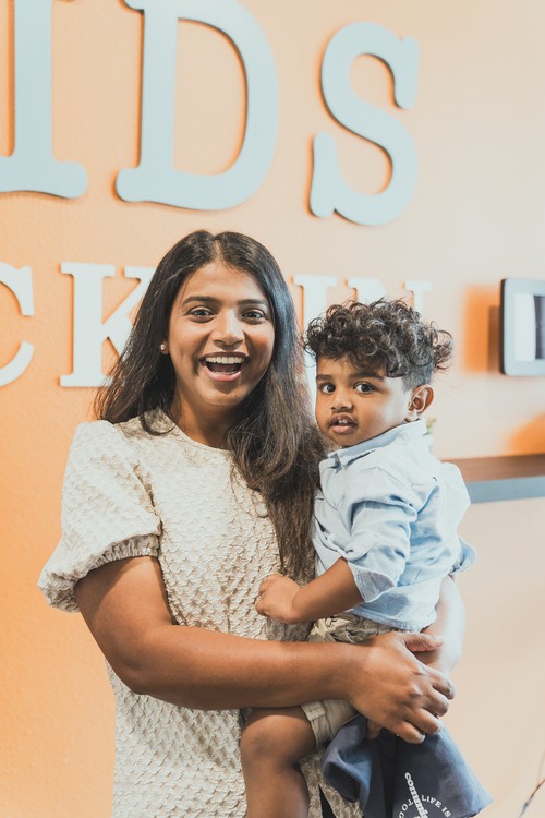 Family check-in at Commission Church Kids Ministry in Plano TX - Non-Denominational Church experience