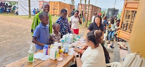 Medical outreach during a mission trip by Commission Church. Serving the community with compassion, as part of Great Commission Church work.